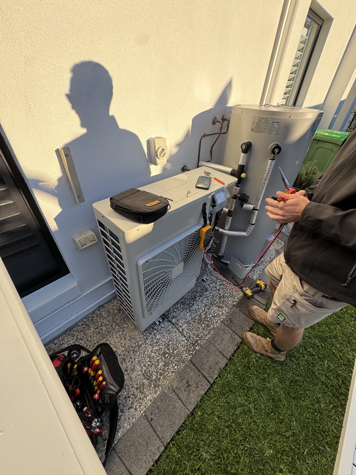 Daikin air conditioning service Gold Coast specialist checking outdoor Daikin aircon unit