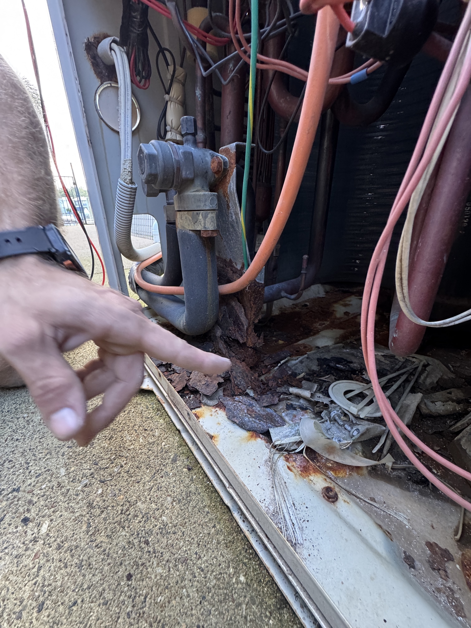 Daikin Service Gold Coast showing internal corrosion inside an outdoor Daikin ducted air conditioning unit