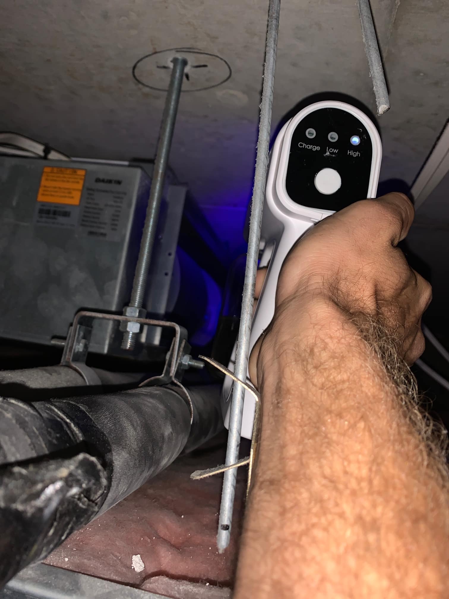 TemperCool technician carrying out air conditioner cleaning with the indoor cover removed on the Gold Coast