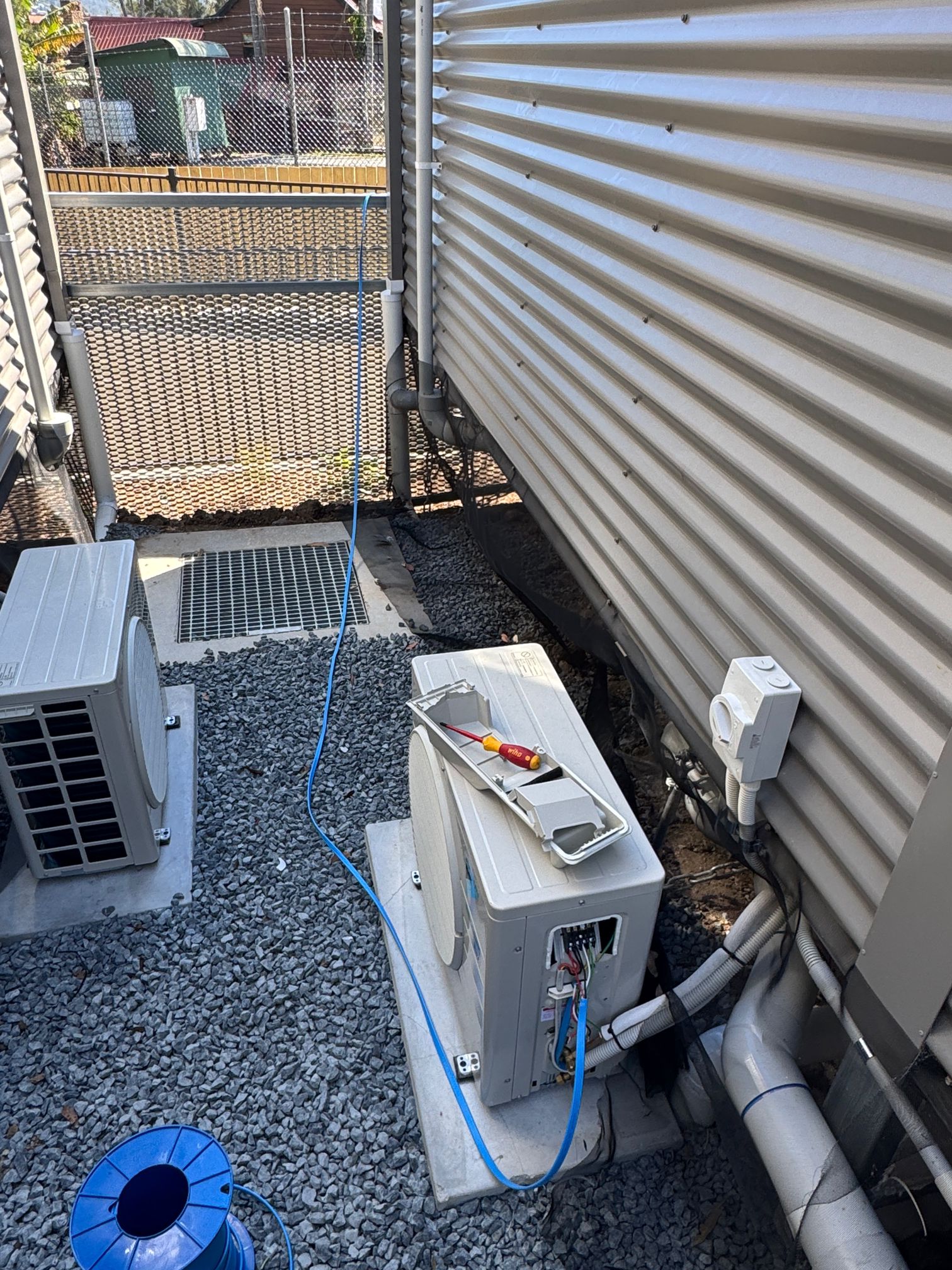 Split system servicing Gold Coast outdoor unit inspection before summer