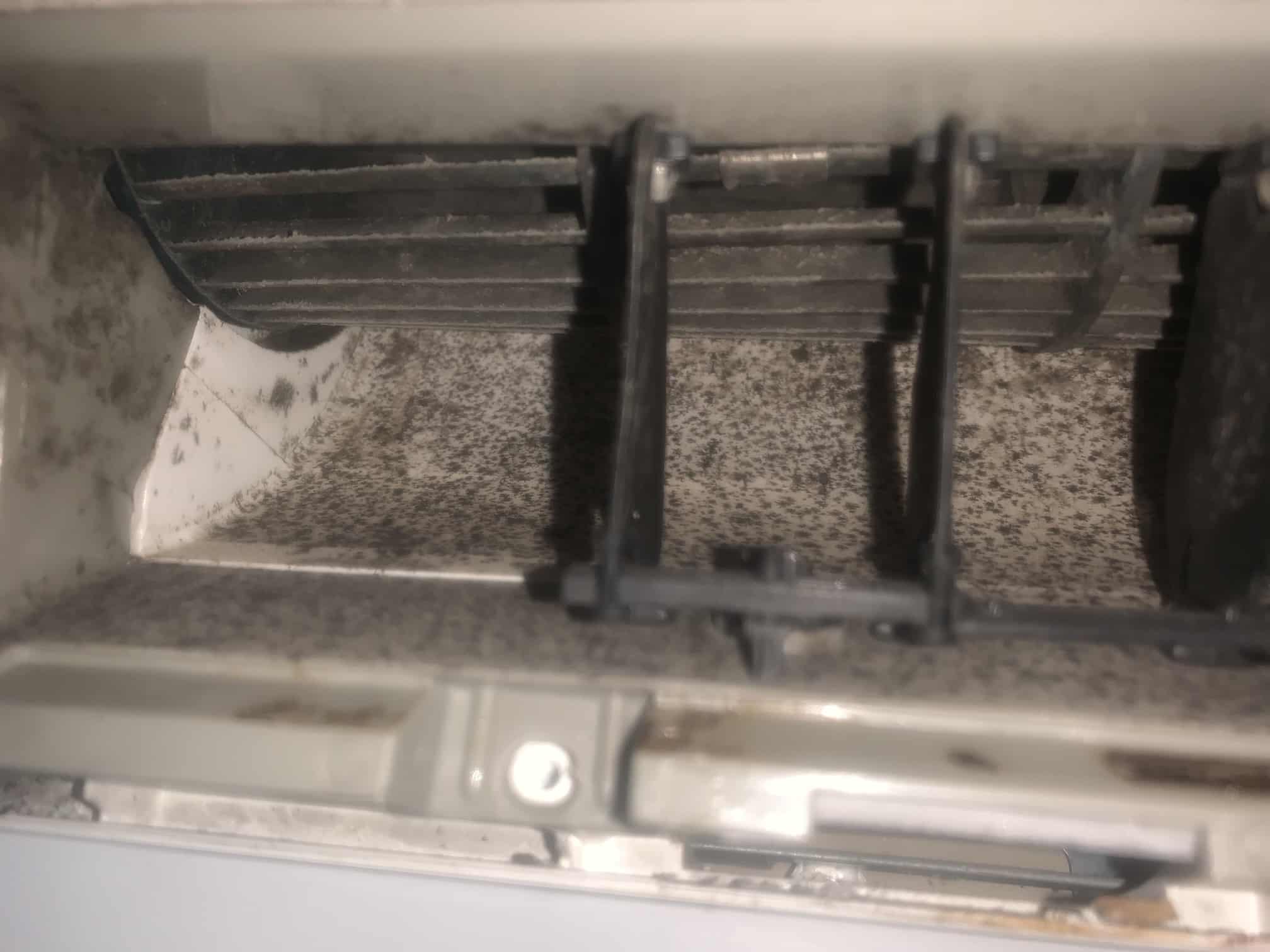 Air conditioner cleaning service Gold Coast indoor split system being checked before summer